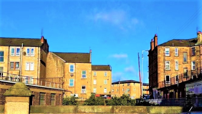 tenements in Govanhill and a nice blue sky